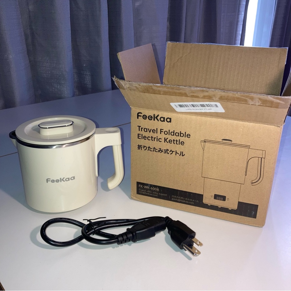 Cream Travel Foldable Electric Kettle FeeKaa Small Space Camping Easy Care Quick